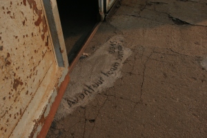 The entrance to the workshop. The team leaves their mark. 